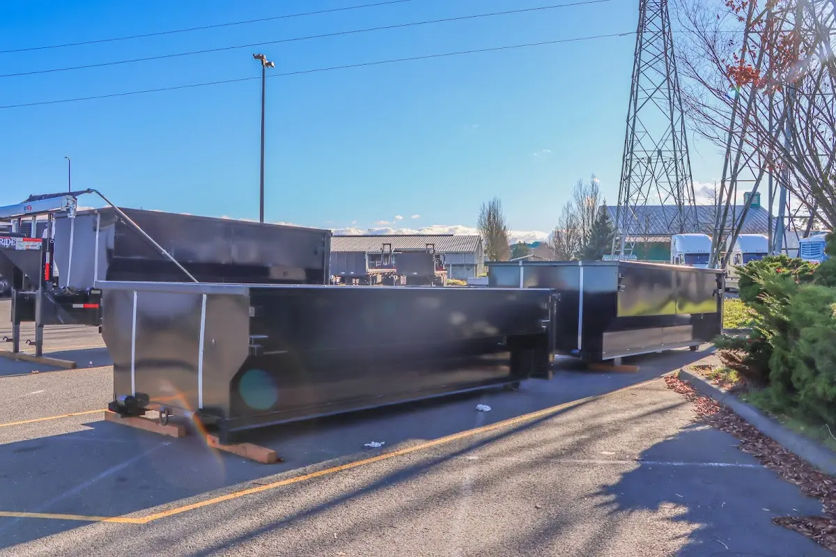 Roll-off dumpster ready for waste disposal at job site for 2 Yard Dumpster Rental in Loveland
